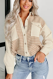 Beige houndstooth corduroy patchwork shacket with button front and chest pockets.