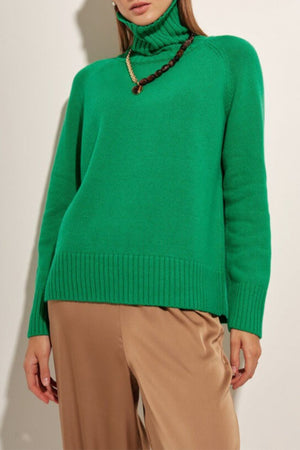 Mid Green cashmere turtleneck sweater with raglan sleeves and ribbed trim.