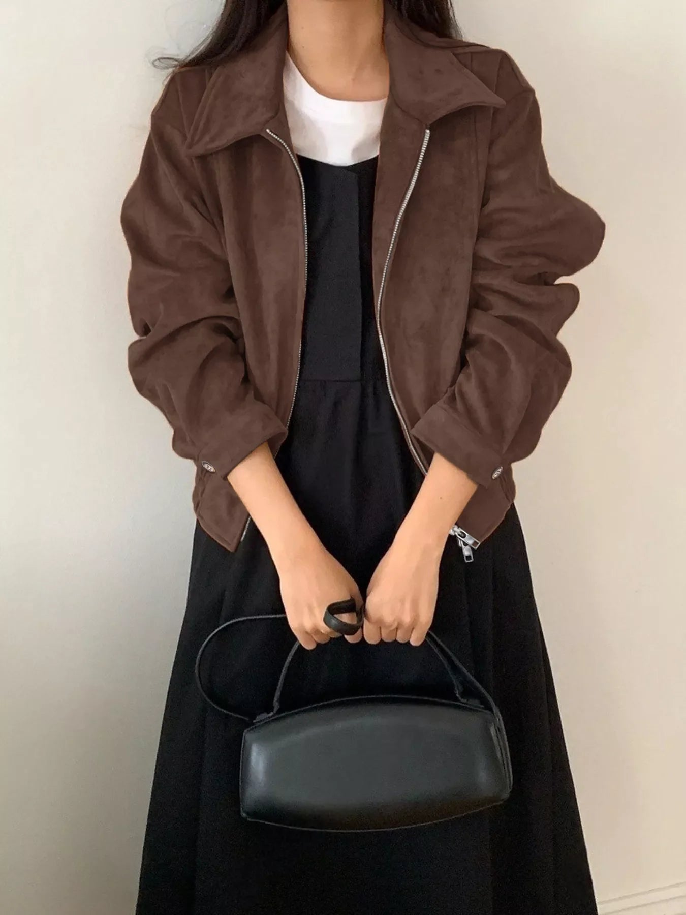 Brown zip-up long-sleeve jacket with a collared neckline and silver zipper detail.