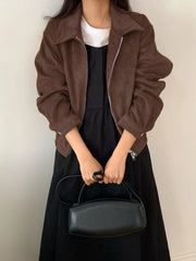 Brown zip-up long-sleeve jacket with a collared neckline and silver zipper detail.