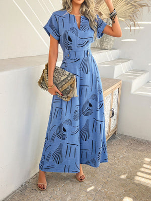 Blue geometric print wide-leg jumpsuit with short sleeves and V-neck