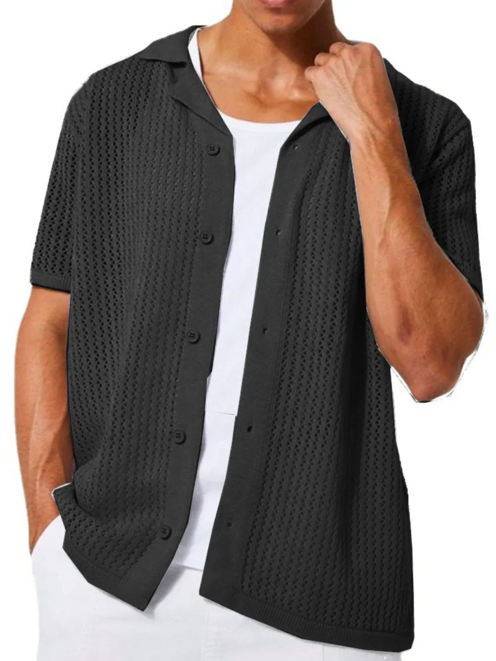 Black open-knit resort shirt with short sleeves, collar, and button front, styled over a white tee.