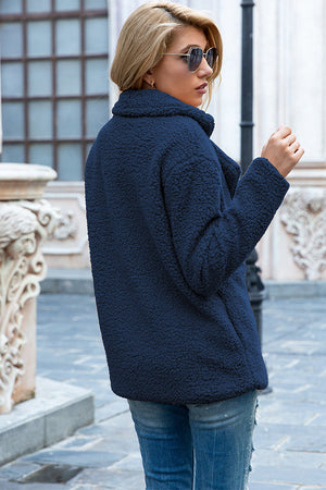 Dark Blue teddy pea coat with a double-breasted closure and a plush texture.