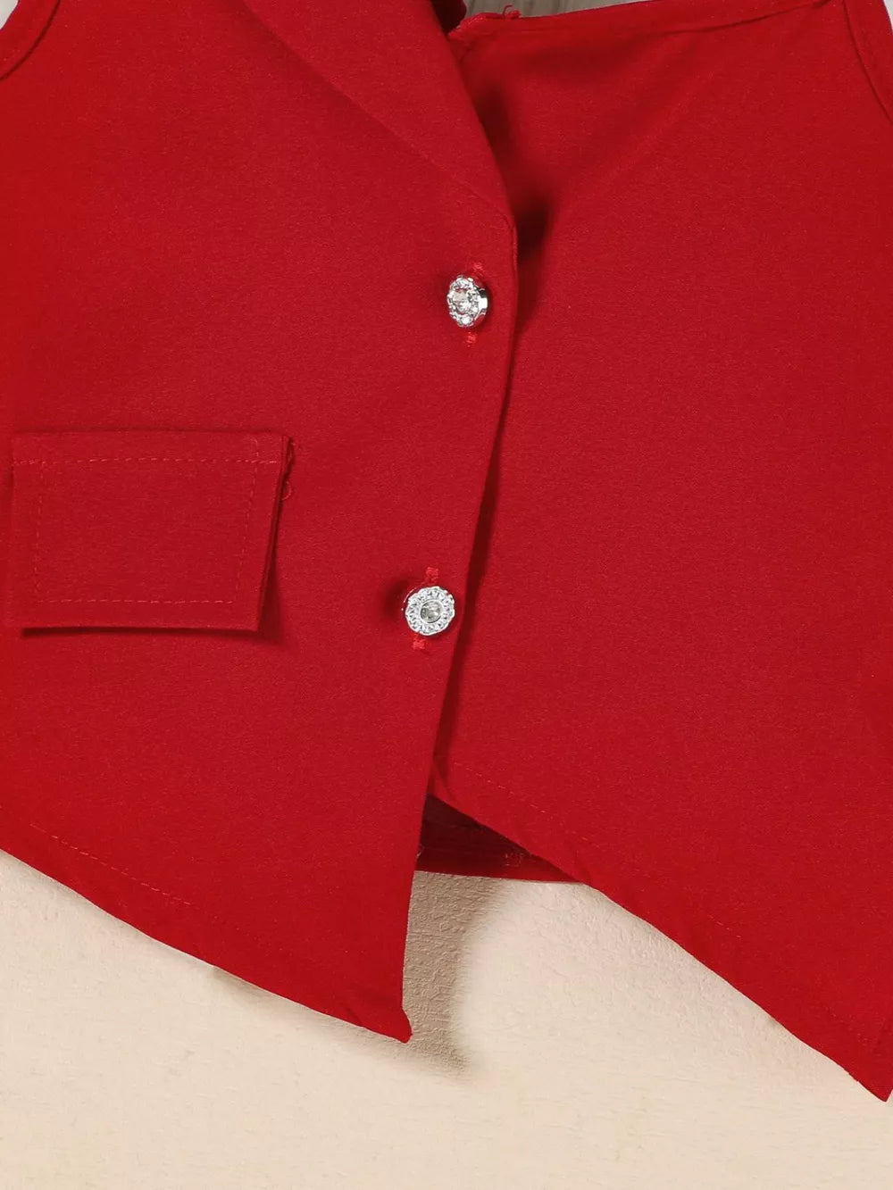 Red asymmetrical vest with jeweled buttons and a pocket detail.