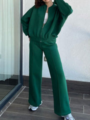 Dark green zip-up bomber jacket and wide-leg pants set with front seams
