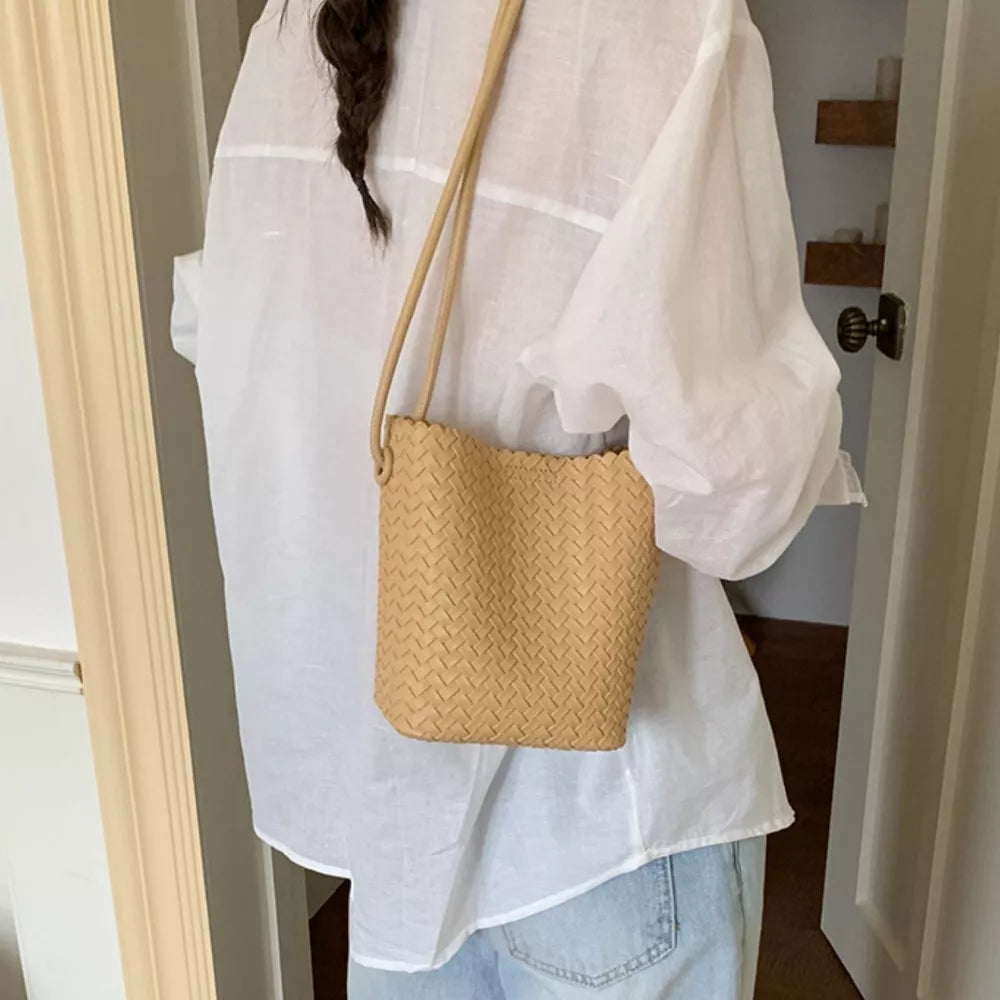 Woven Straw Crossbody Bag in Yellow, model styling view