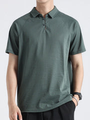 Dark green cotton blend polo shirt with short sleeves and a two-button placket.