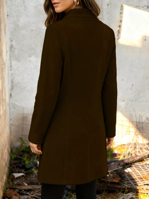 Chic longline trench coat in chocolate, button-down style, collarless, long sleeves.
