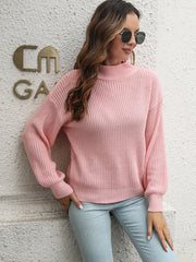 Dusty pink acrylic mock neck sweater with balloon sleeves and ribbed details