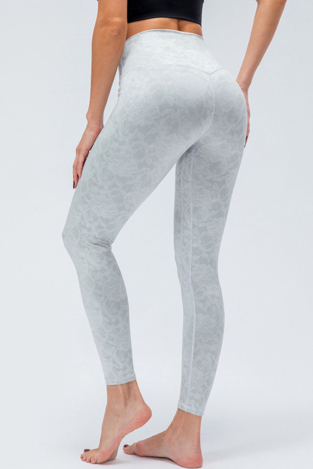 Gray high-rise performance leggings with all-over lace pattern