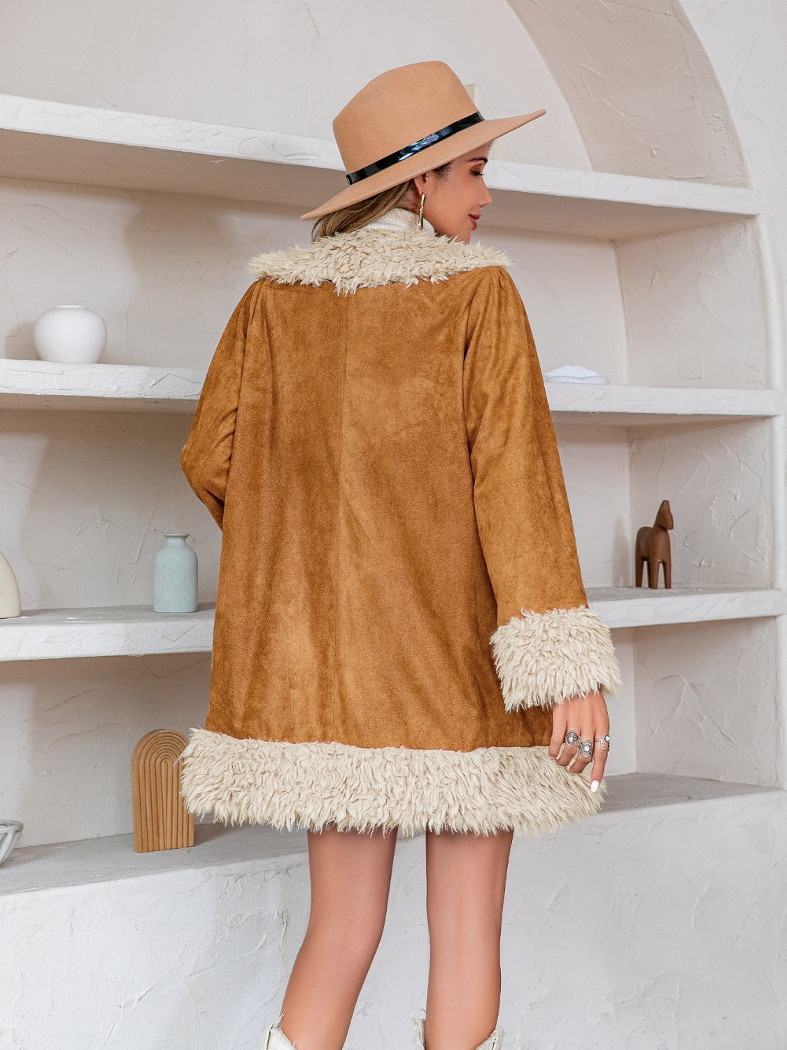 Caramel suede coat with shearling trim on collar, cuffs, and hem.