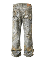 Distressed gray wide leg denim jeans with treasure print and distressed details.