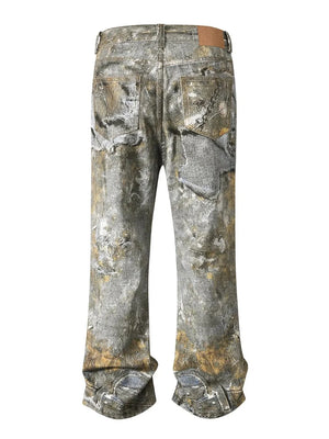 Distressed gray wide leg denim jeans with treasure print and distressed details.