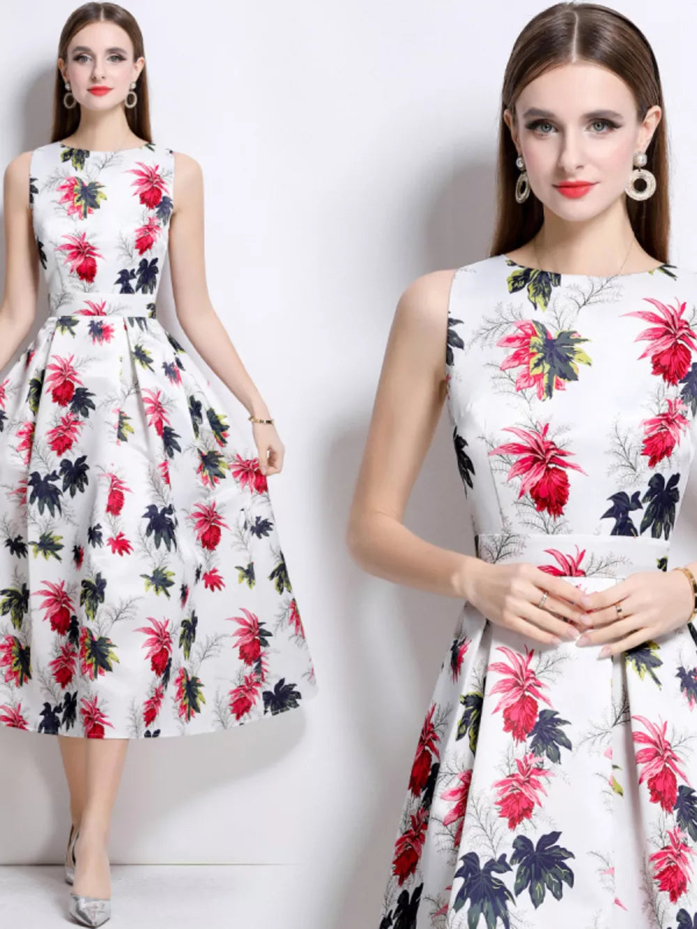 White a-line midi dress with a colorful floral print, sleeveless, round neck, and pleated skirt.