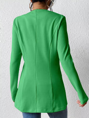 Green single-button blazer with tailored fit and textured fabric.
