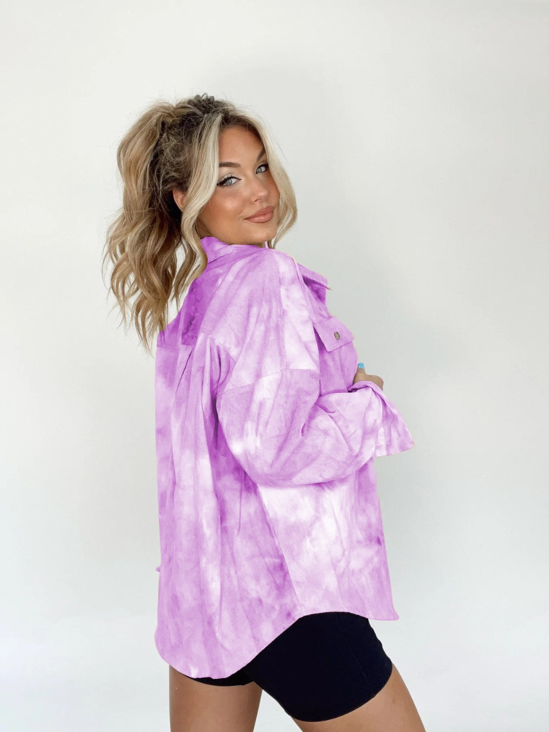 Heliotrope purple tie-dye overshirt with patch pockets and button front, styled casually.
