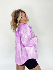 Heliotrope purple tie-dye overshirt with patch pockets and button front, styled casually.