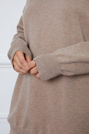 Relaxed knit polo co-ord set in Khaki, showing ribbed cuffs and neckline detail.