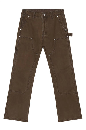 Chocolate wide leg carpenter pants with utility seams and silver hardware.