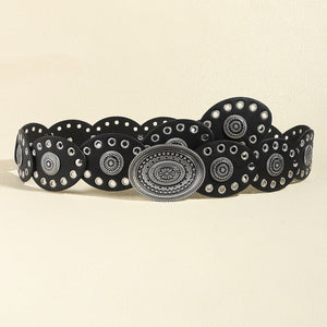 Black leather belt with eyelets and antique silver oval buckle and decorative studs.