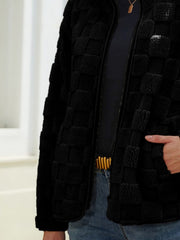 Black textured grid zip-up jacket with a plush feel and casual cut.