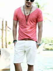 Men's relaxed fit cotton tee in Watermelon Red with a deep scoop neckline.