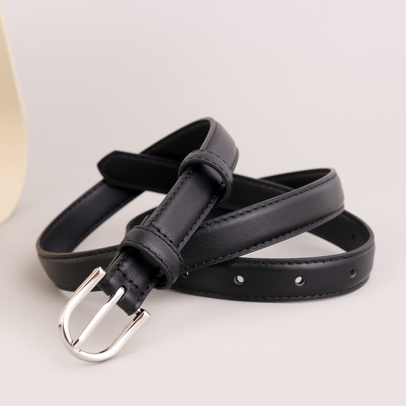 Skinny black leather belt with silver buckle and keeper loop