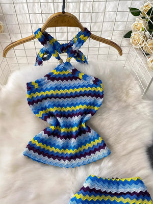 Chevron knit halter crop top and maxi skirt set in blue, yellow, and purple zigzag pattern.