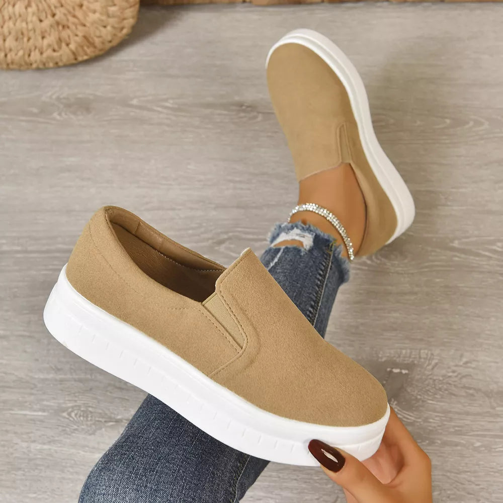 Round Toe Platform Slip-ons in Black, model styling view