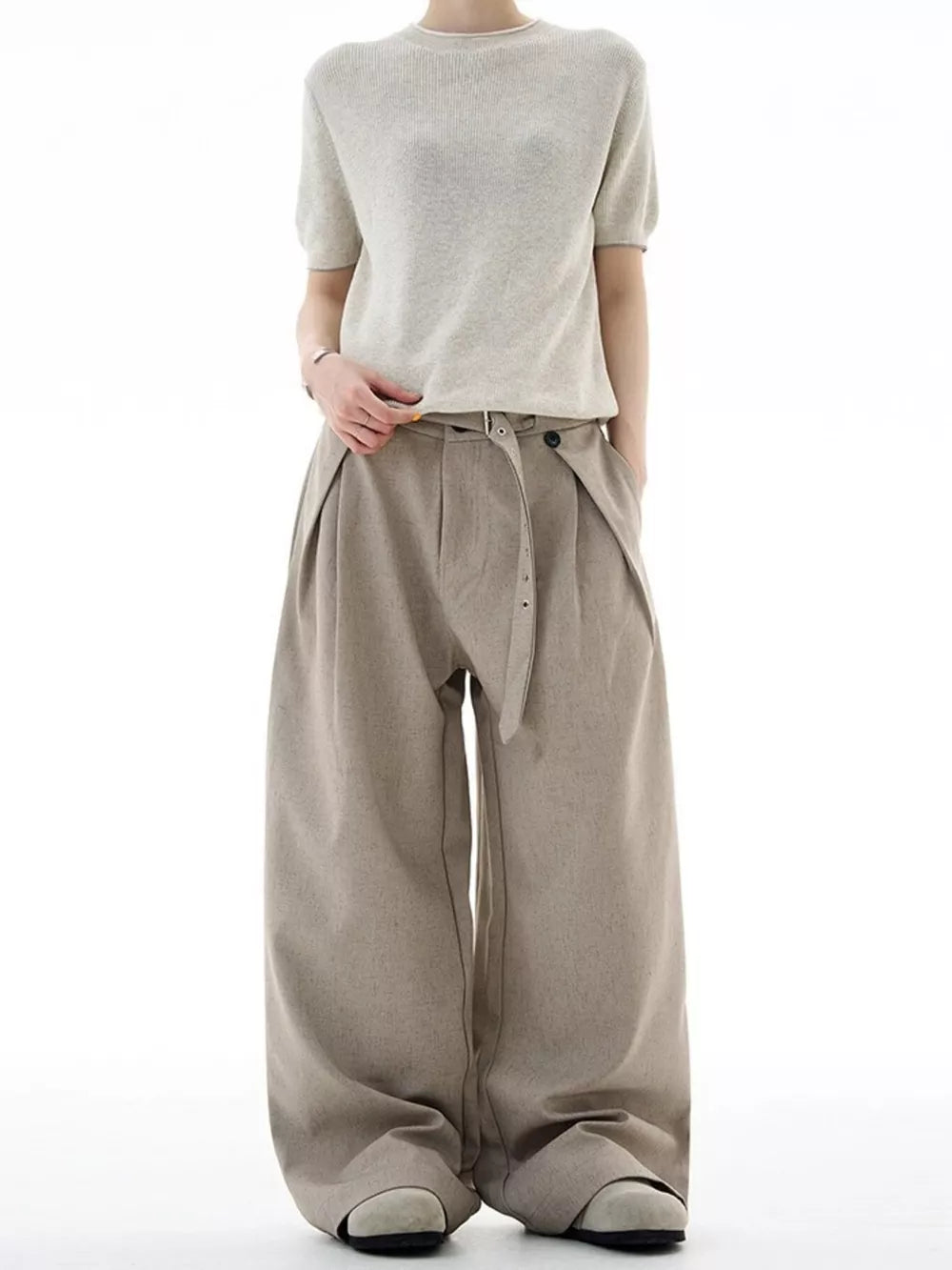 Tailored plus size wide-leg sweatpants in khaki with a belted waist and pleats.