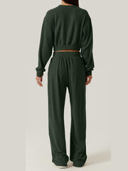 Army green knit lounge set with cropped sweatshirt and wide-leg pants.