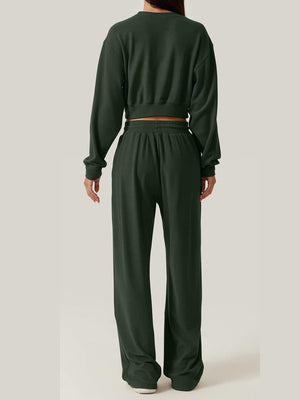 Army green knit lounge set with cropped sweatshirt and wide-leg pants.
