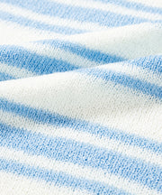 Boxy knit t-shirt with blue and white stripes, acrylic fabric detail.