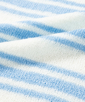 Boxy knit t-shirt with blue and white stripes, acrylic fabric detail.
