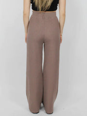 Luxe ribbed knit palazzo trousers in taupe, featuring a wide leg and high waist.