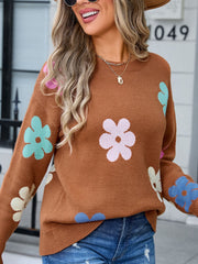Brown crewneck sweater with colorful floral print, acrylic knit.