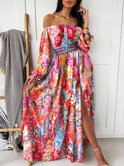 Vibrant floral off-shoulder maxi dress with balloon sleeves and a high slit.