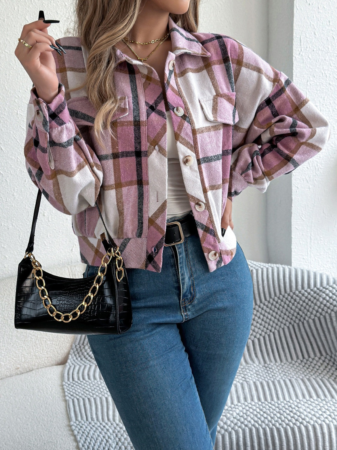 Cropped plaid shacket in dusty pink with gathered sleeves, button front and chest pockets.