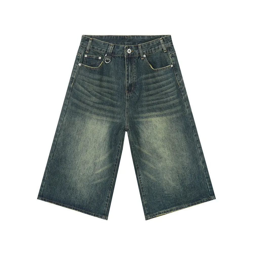 Wide-leg denim culottes in a distressed blue wash with a high waist.