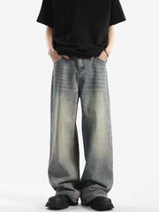 Men's relaxed fit vintage wash baggy jeans in light blue cotton blend.