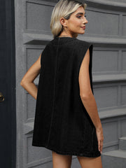 Black denim vest with button front and sleeveless design