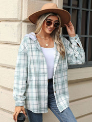 Light Green hooded plaid shacket with button front and drawstring.