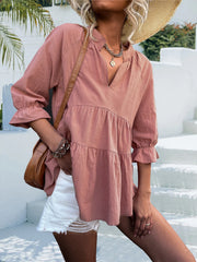 Tiered linen blouse in dusty pink with ruffled sleeves and V-neck