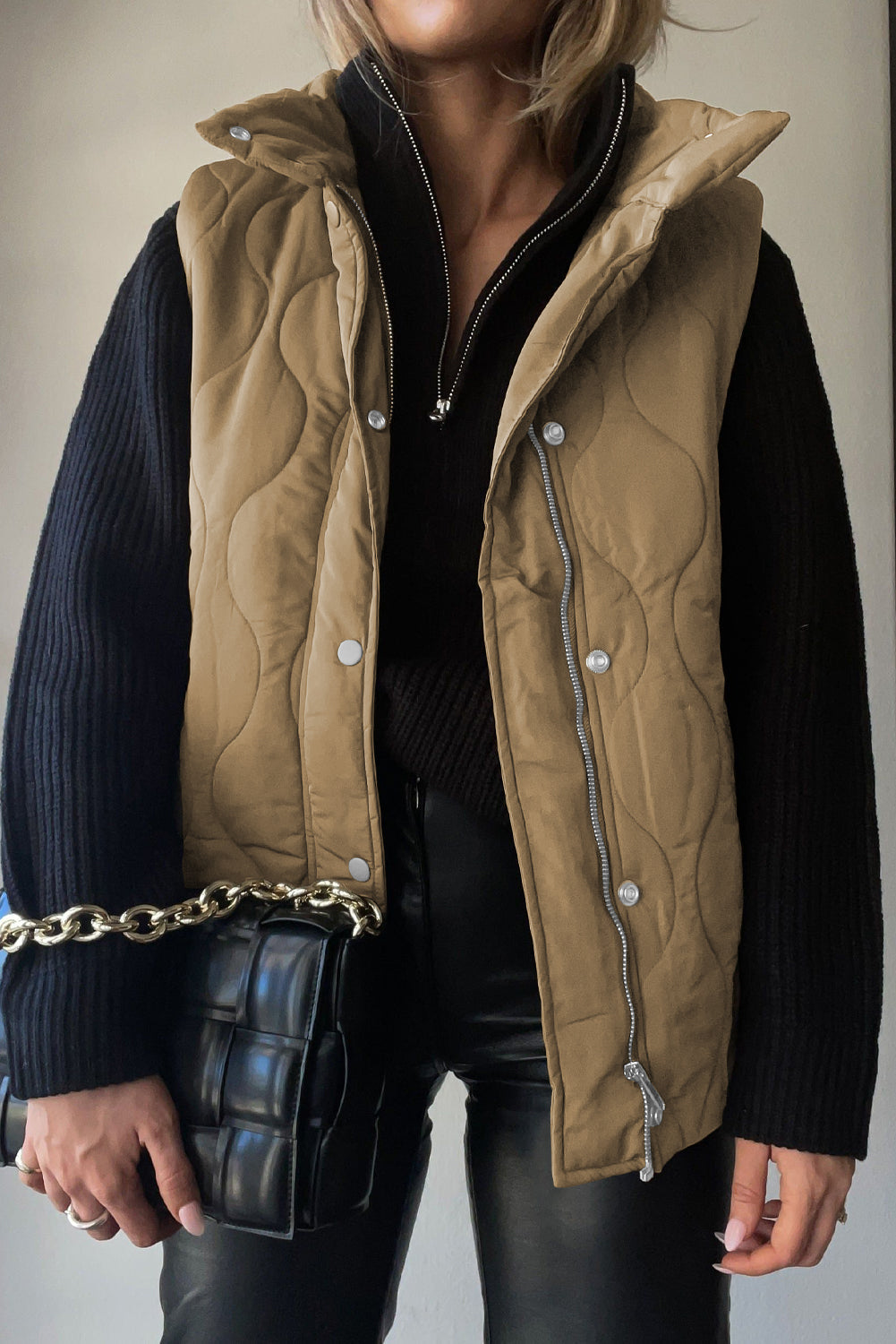 Quilted stand-collar utility gilet in taupe with diamond stitching and silver hardware.