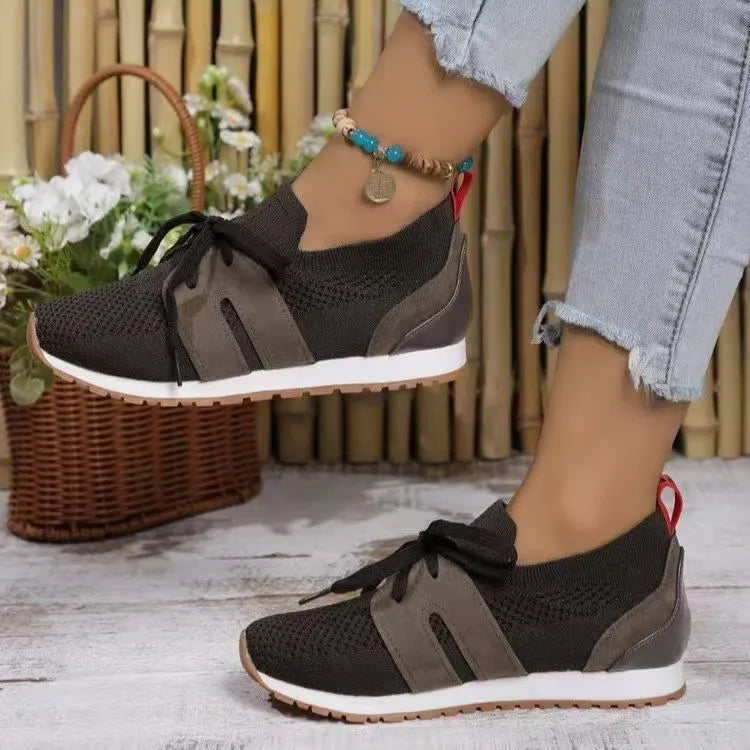 Knit & suede lace-up sneakers in dark gray with brown accents and white soles.
