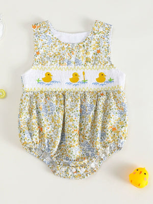 Baby floral one-piece with smocked chest and embroidered ducks.