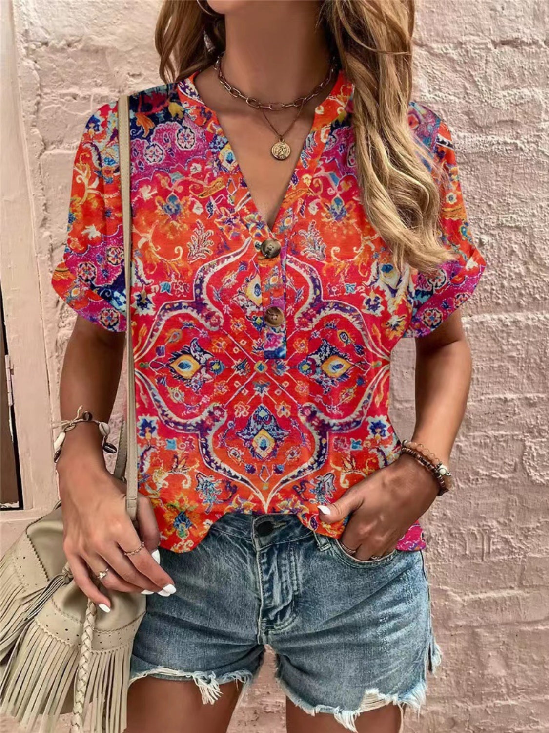 Americana Henley print top with button detail and short sleeves.