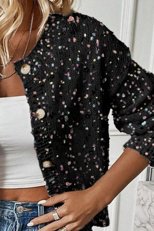 Black confetti knit button-up cardigan with colorful speckles and button details.