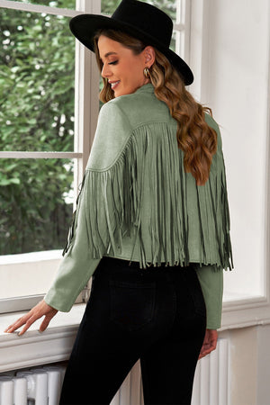 Sage green suede cropped jacket with fringe detail and long sleeves.