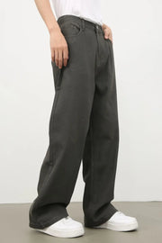 Dark gray wide-leg 100% cotton jeans with elasticated waistband and pockets.